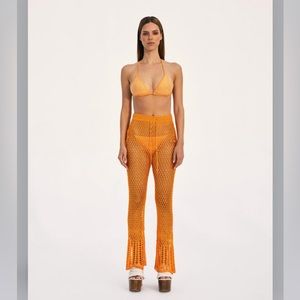Cult Gaia Iriel crochet cover up pants in orange apricot